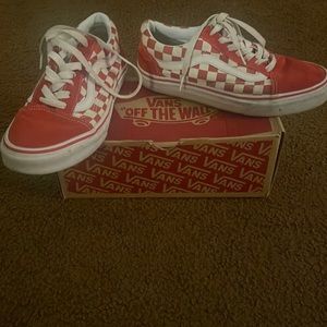 Red and white checkered board vans